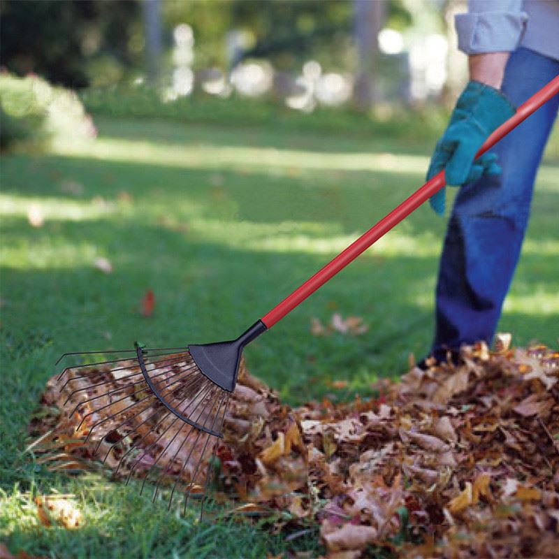 Metal garden lawn rake operation